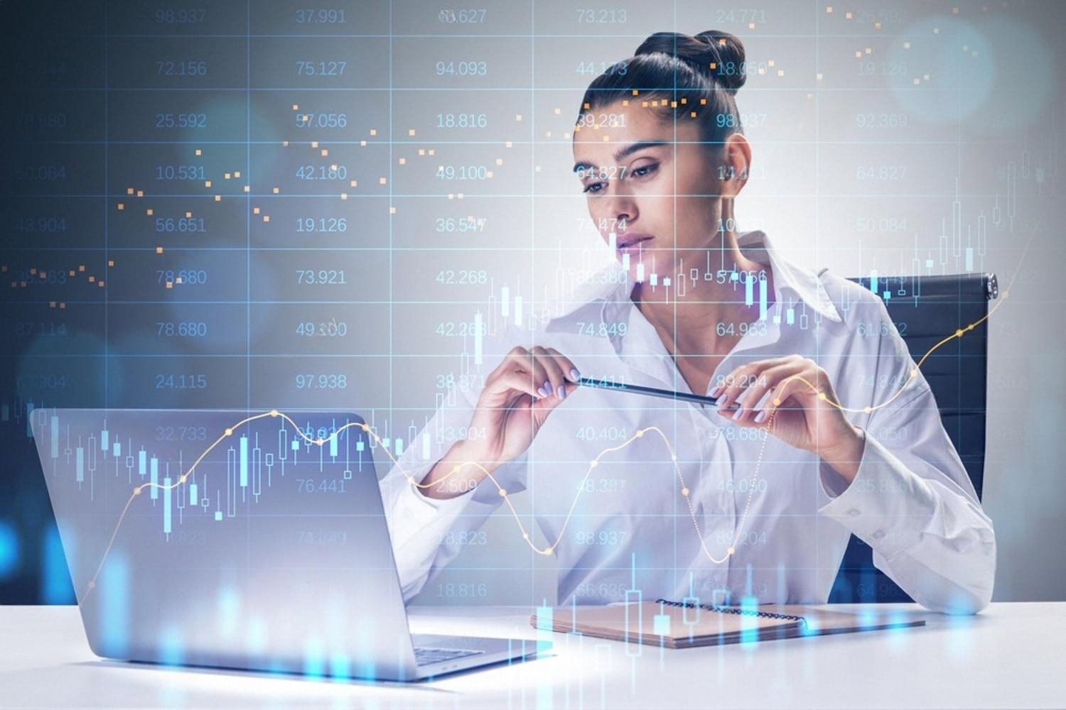 Analyst reviewing AI-generated market charts and financial risk indicators on a laptop